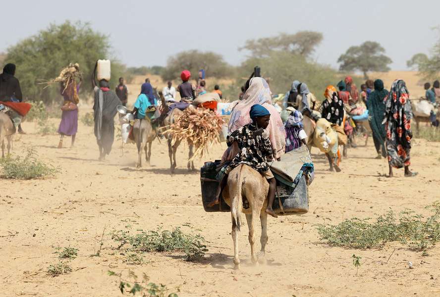 Sudanese refugees who have fled the violence in the Darfur region seek temporary refuge in Goungour, Chad