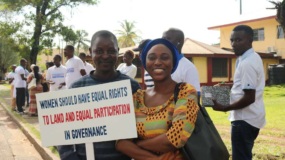 Women protesting for better land rights and equal participation in Liberia