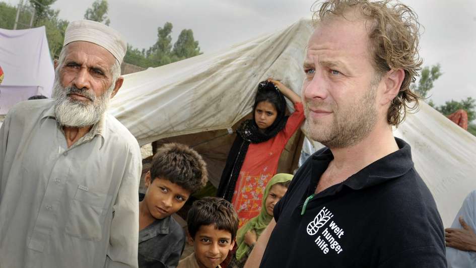 Refugees build their tents close to the highway between Peshawar and Mardan, Pakistan