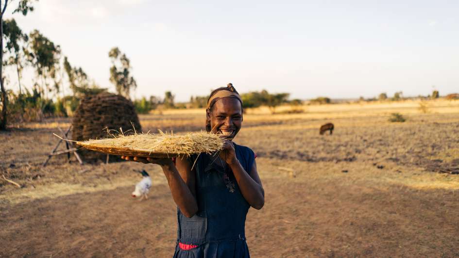 A smallholder at the grain harvest in the village of Sodo, Ethiopia