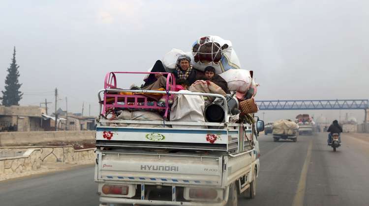 People fleeing in a car