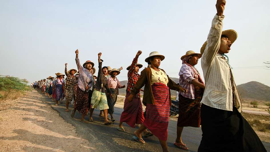 Village residents protest their land being seized for a copper mining project in northwestern Myanmar. 