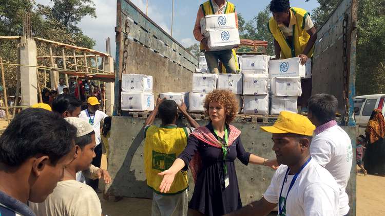 Distributing hygiene kits to Rohingya refugees in Bangladesh. 