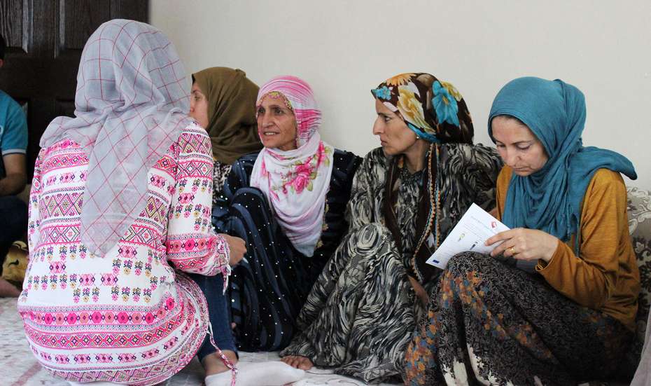Syrian women attending awareness session on early marriage in Mardin, Turkey, in June 2018.