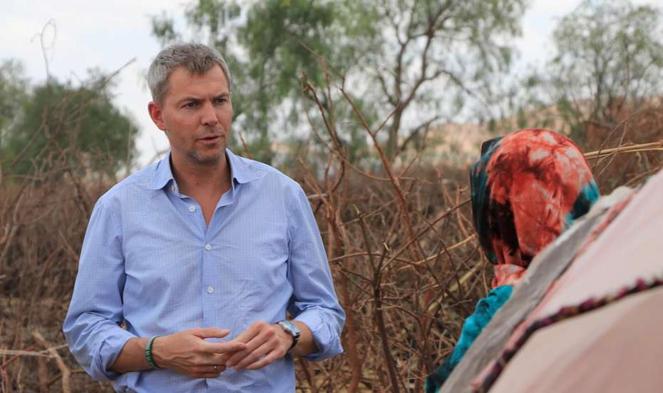 Till Wahnbaeck, CEO of Welthungerhilfe, in discussion with a village resident in Somaliland.