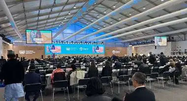 Inside conference room at COP17 in Mongolia with view of the stage.