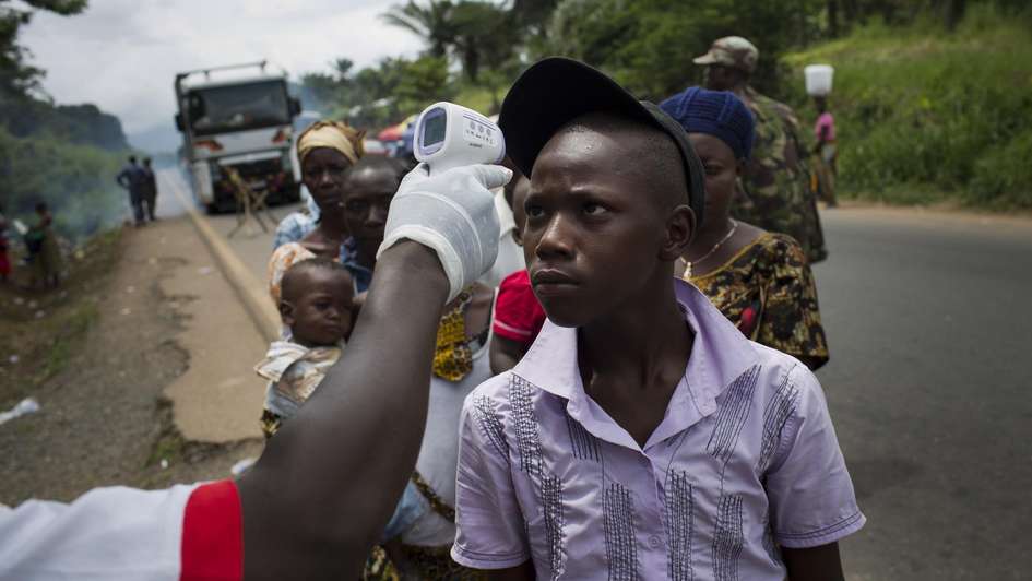 Taking temperatures of people is still an ongoing preventive measure in Sierra Leone and Liberia.