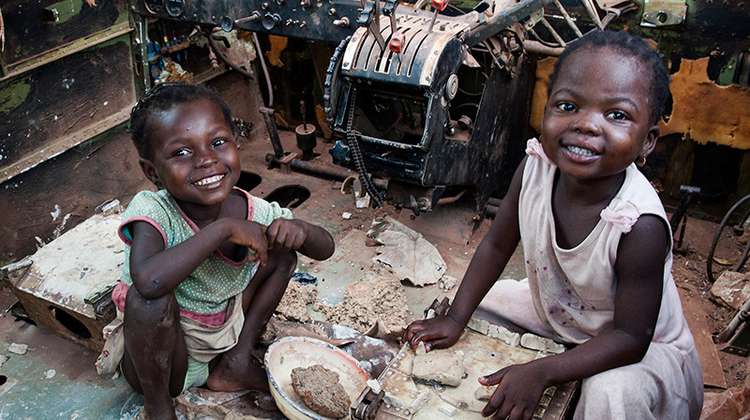 Two children are playing in a plane wreck at the IDP camp in Bangui