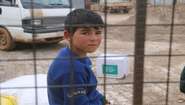 A boy in a refugee camp in Azaz.