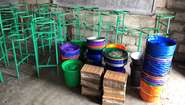 Handwashing stands, buckets and other equipment in a school in the DR Congo