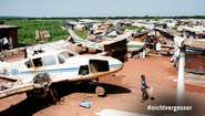  Destroyed airplanes and tents in the Central African Republic. 