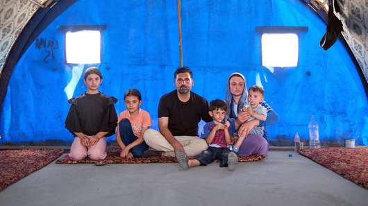 Murad and Khalida, alongside their children in Sinjar District, Ninewa