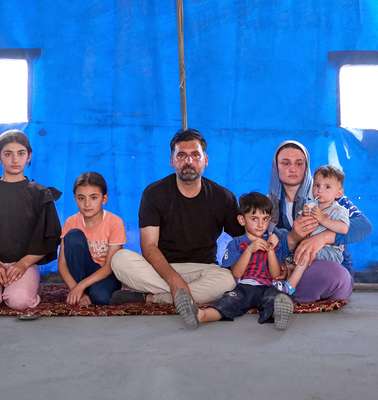 Murad and Khalida, alongside their children in Sinjar District, Ninewa